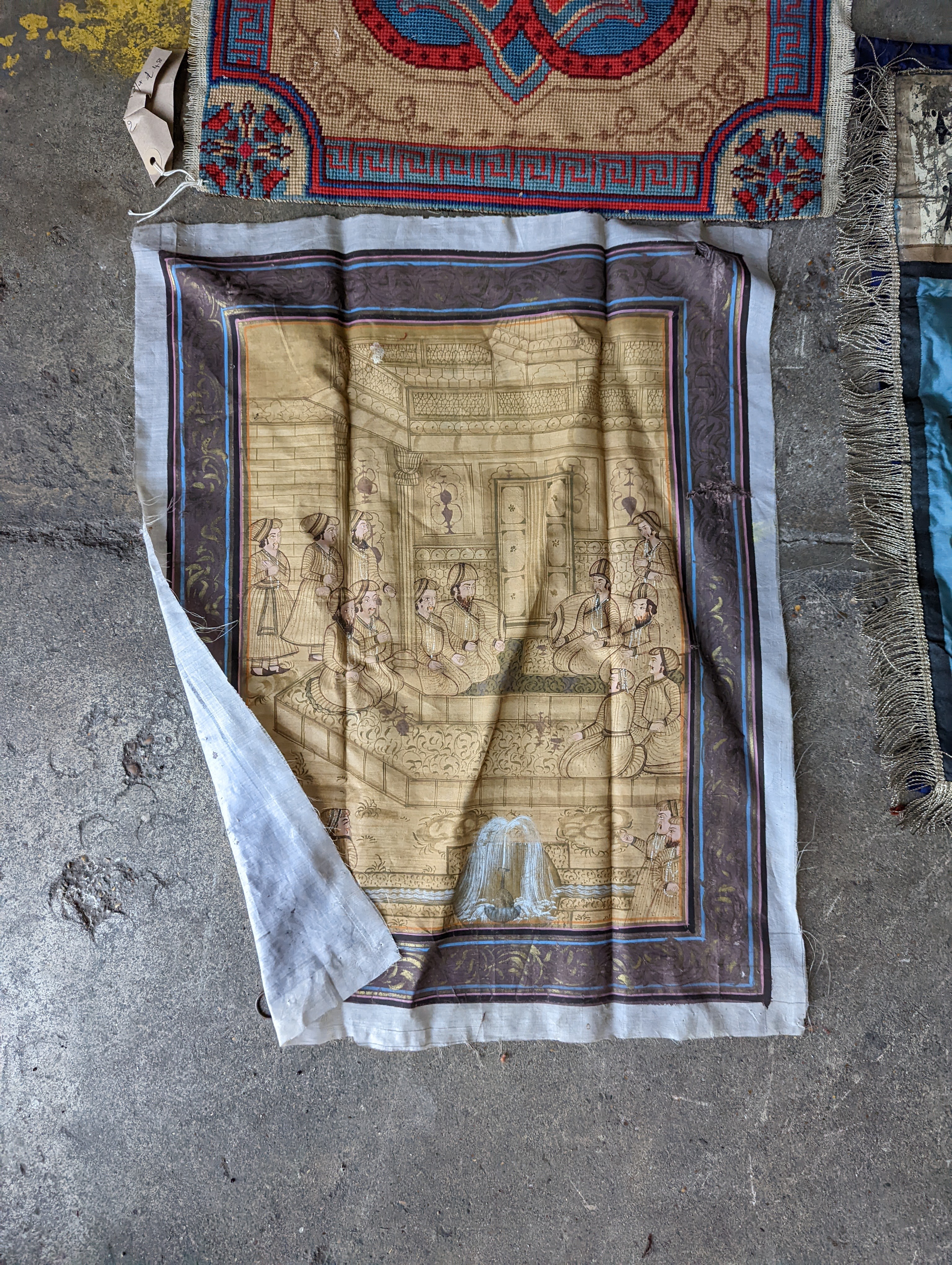 An Ottoman silk Koran cloth, three needle and bead work covers and assorted textiles